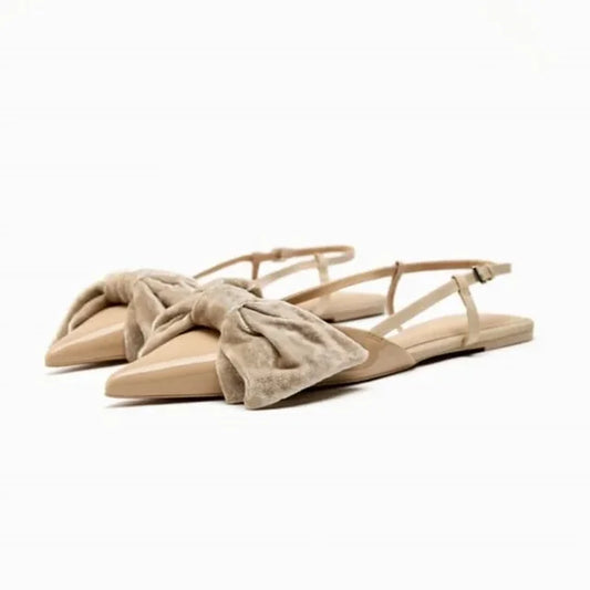 Light beige bow embellished exposed heel flat shoes