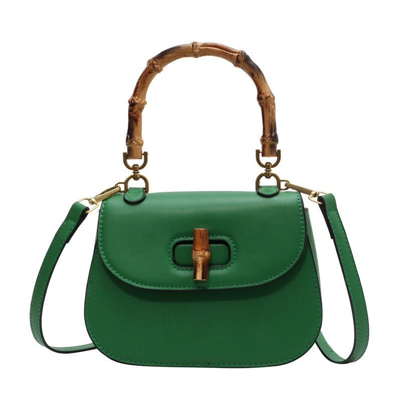 Handheld bamboo bag women's shoulder bag retro saddle bag.