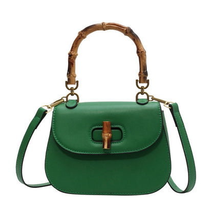 Handheld bamboo bag women's shoulder bag retro saddle bag.